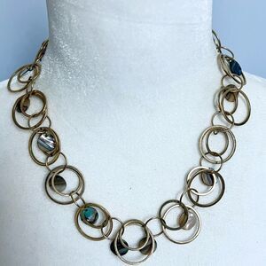 Lia Sophia gold tone link and opalescent medallion necklace